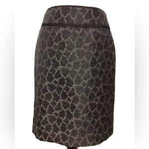 THINK Tank black animal print midi skirt size 2